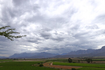 Fototapeta premium Clouds moving in across the Breede River Valley