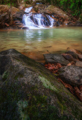 Naklejka na ściany i meble Ka Thing water fall. Beautiful waterfall with lots of water. Khitchakut Mountain national park.