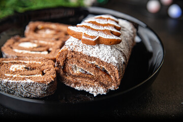 christmas cake chocolate roll new year meal sweet dessert on the table copy space food background rustic 