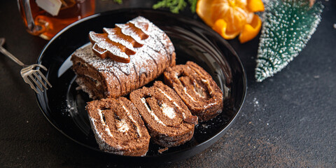 christmas cake chocolate roll new year meal sweet dessert on the table copy space food background rustic 