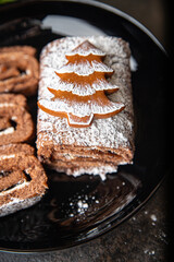christmas cake chocolate roll new year meal sweet dessert on the table copy space food background rustic 