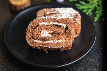christmas cake chocolate roll new year meal sweet dessert on the table copy space food background rustic 