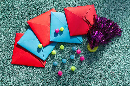 Korean traditional outdoor game tools on the playground. Gonggi, Ttakji and Jegi. Top view.
