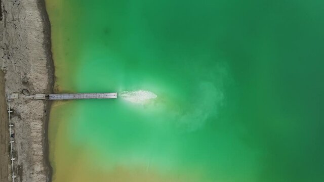 Bird's-eye. Environmental pollution problem concept. Ecological catastrophy. drone footage. Lake of chemical waste.