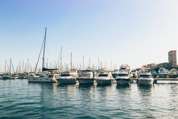 Fototapeta na wymiar View of sport seaport with green water in spanish coast city Alicante 