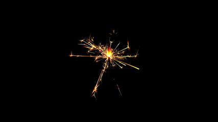 Burning sparkler on black background. Burning New Year sparkler