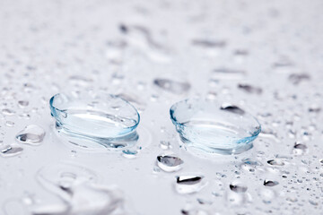 contact lenses with droplets around close up view  - Image