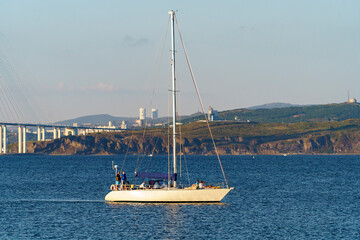 Seascape with a white yacht. Vladivostok, Russia