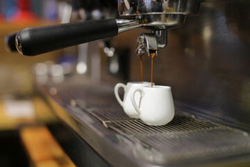 espresso machine pouring coffee