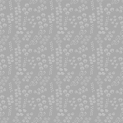 Seamless background. Drawn by hand. Traces of humans, birds and animals are depicted on a gray background. Can be used for fabric, wallpaper, background, wrapping paper.