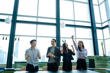 Successful business team,Business team celebrating a good job in the office.