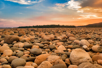Beautiful riverside stone view in the afternoon with blue sky. Bangladesh Landscape. - obrazy, fototapety, plakaty