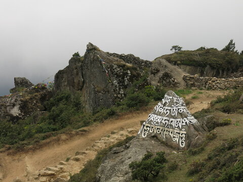 Painted and carved mani stome in Namche Bazaar, Nepal.
