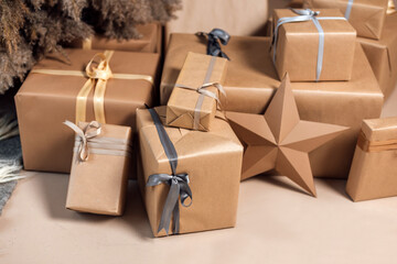 Christmas gifts and handmade presents packed in kraft paper