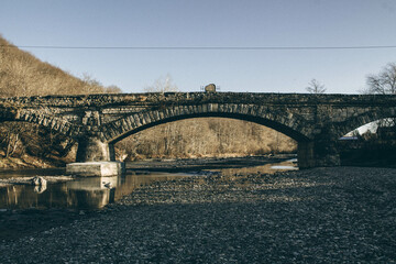 Fototapeta premium old bridge over the river