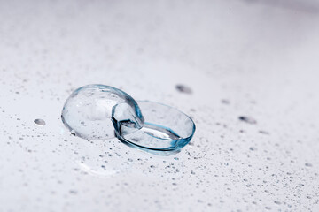 contact lenses with droplets around close up view  - Image