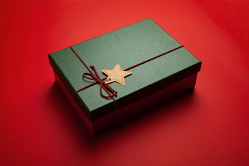 Gift box or Christmas gift box on a red background.