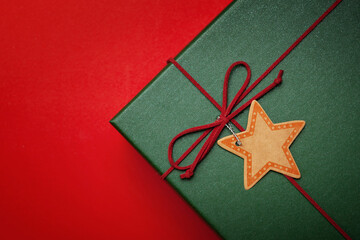 Gift box or Christmas gift box on a red background.