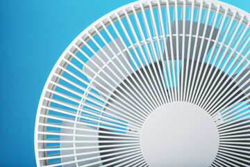The grille and blades of the electric fan are white on a blue background