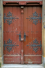 Closed vintage door with metal in Krakow - 471868112