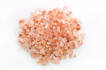 Pink Himalayan salt,  isolated on white background.