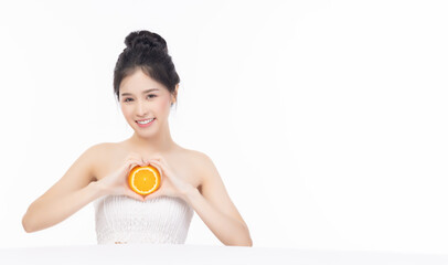 Young asian girl show slice of orange Vitamin C for nice skin Portrait beauty pretty young asian...