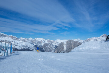 Fototapeta na wymiar Alpine skier on slope at Cortina