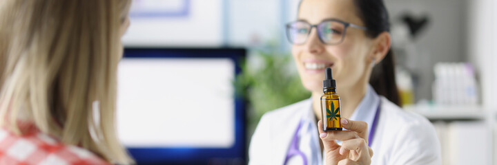 Doctor shows patient bottle of marijuana oil