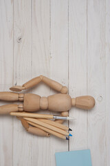 mannequin for drawing art design creative colorful stickers wooden background