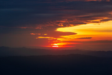 mountains and sky at sunrise,Sun falls at Phu Kradueng National Park, Thailand