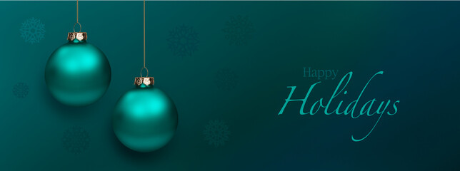 Glänzende  Weihnachtskugel am Band auf türkis-blauem Hintergrund