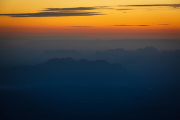 mountains and sky at sunrise,Sun falls at Phu Kradueng National Park, Thailand