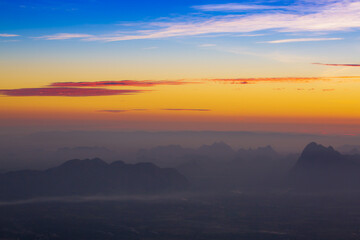 mountains and sky at sunrise,Sun falls at Phu Kradueng National Park, Thailand