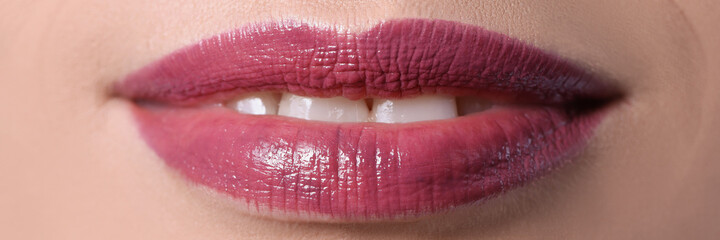 Festive professional evening lip makeup. Bright color seductive female mouth