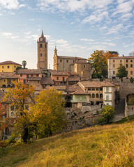 Fototapeta na wymiar Panoramic sight of Monforte d'Alba village during fall season. Langhe region of Piedmont, Cuneo, Italy.