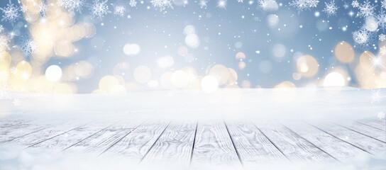 Winter Christmas scenic background with wooden table and copy space.