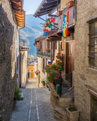 Fototapeta premium The beautiful village of Usseaux, during fall season, in Chisone Valley. Province of Turin, Piedmont, Italy.