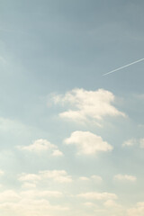 White clouds against the blue sky.