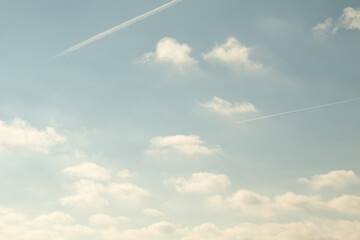 White clouds against the blue sky.