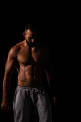 Fototapeta premium Portrait of guy taking a break form the exercise