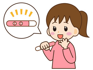 妊娠検査薬の陽性反応に喜ぶ女の子