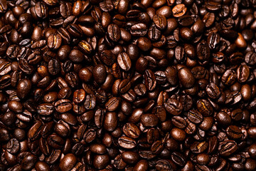 Roasted coffee beans background.Closeup shot.