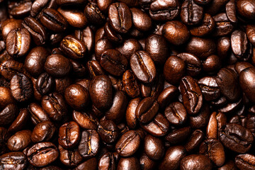 Roasted coffee beans background.Closeup shot.
