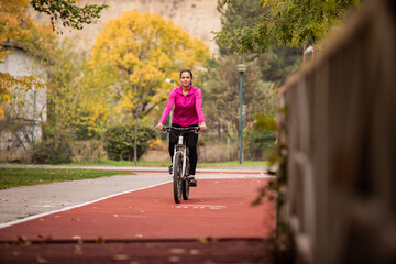 Riding a bicycle on the red track