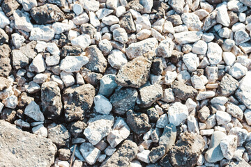 Pebbles background, abstract background with dry round gray reeble stones