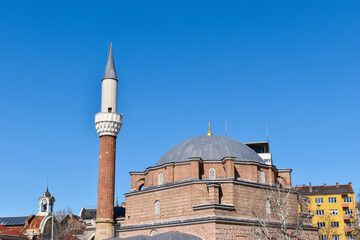 Fototapeta na wymiar The Banya Bashi Mosque in Sofia, Bulgaria. Center of the Bulgarian capital, clear blue sky