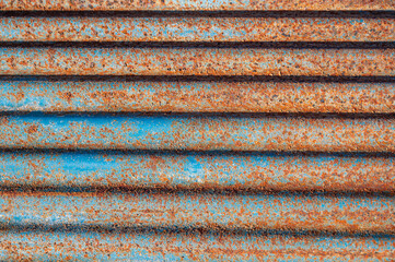 錆びた青色のトタン板