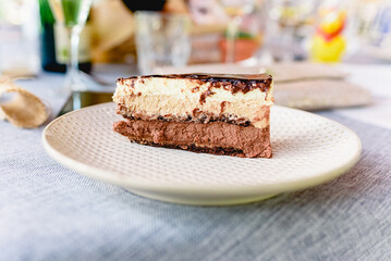 Tasty chocolate cake elegantly served during a wedding.