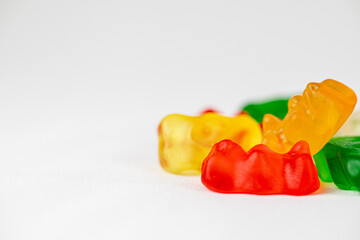 Colorful and delicious gummy bear candies with a white background