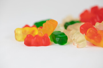 Colorful and delicious gummy bear candies with a white background